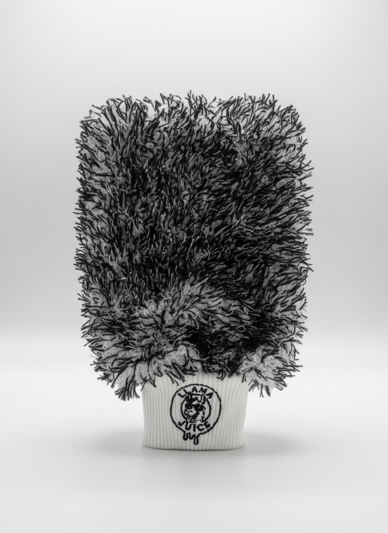 Black and gray textured plant in a white pot with a logo on a light gray background